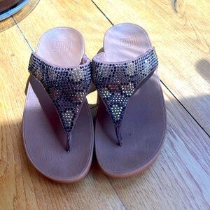 Animal print fit flops barely worn.